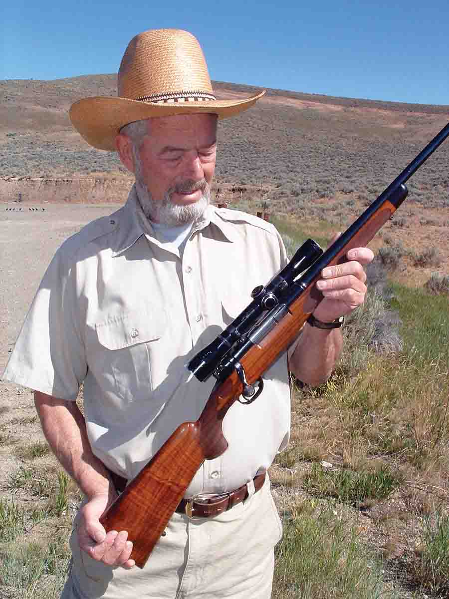 Chub Eastman at the Virtue Flat range near Baker City, Oregon, admiring Jack O’Connor’s Sheep Rifle No. 2.